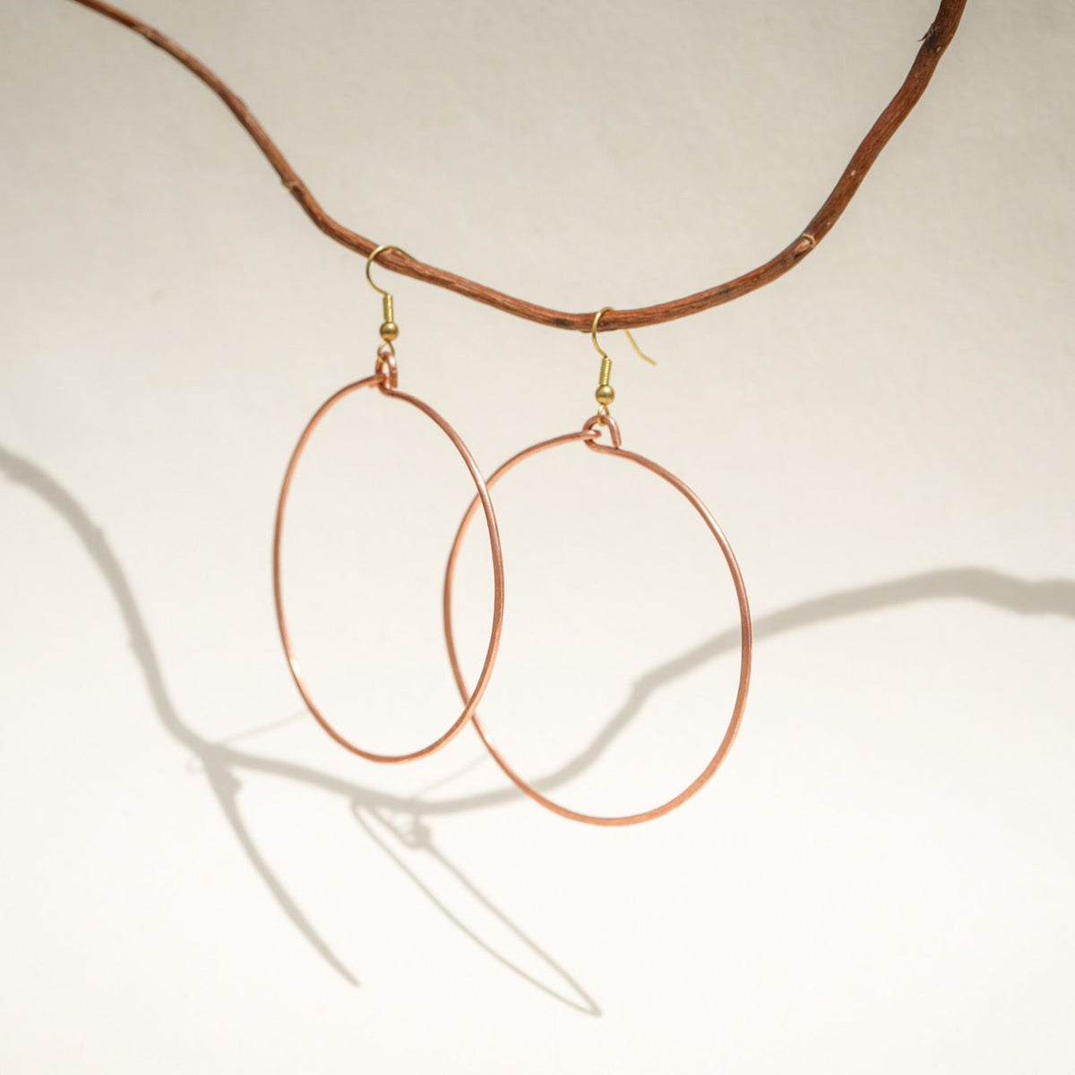 Hammered hoops - Twisted Silver