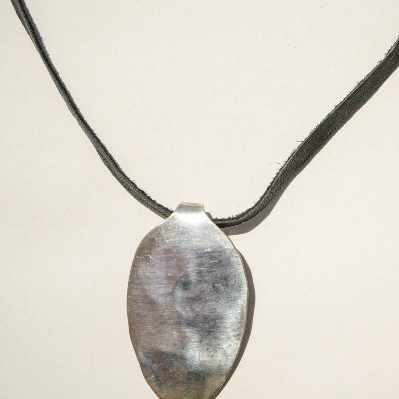 Leather rocker necklace - Twisted Silver
