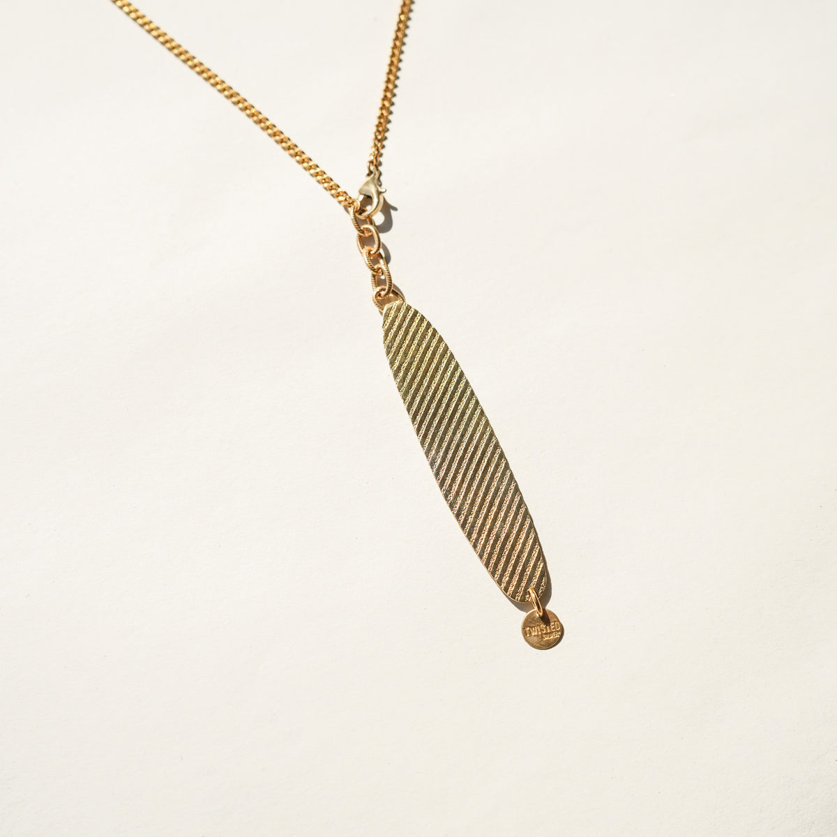 Golden palm necklace - Twisted Silver